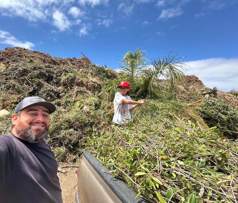 Armando and son at work — Your Junk in my Trunk, Imperial Beach CA